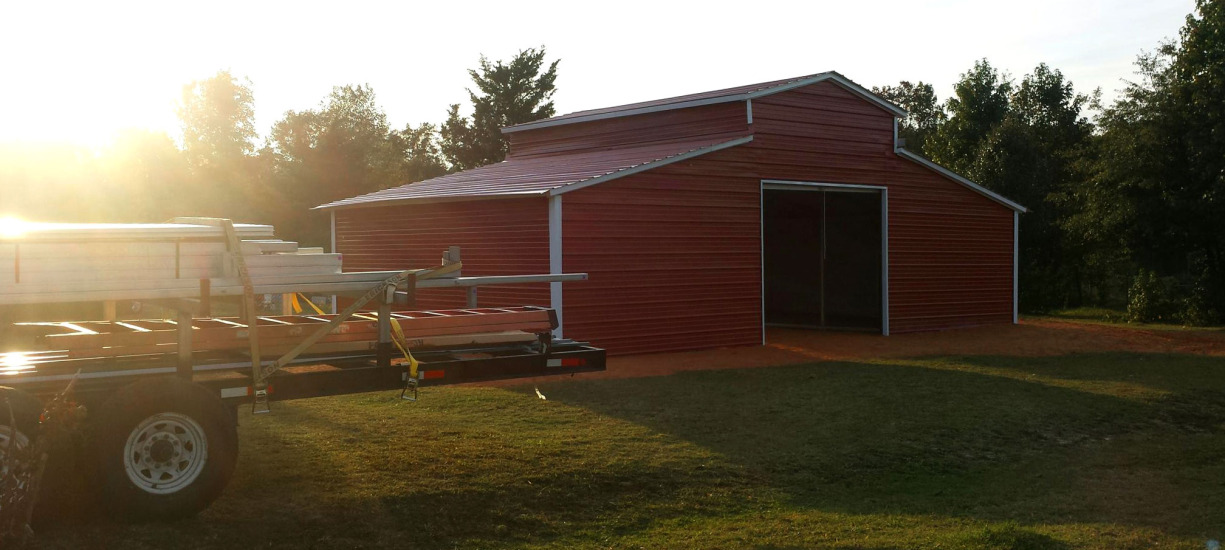 Metal barn construction complete, job well done.