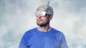 Roll up tin foil hat and tin foil glasses.