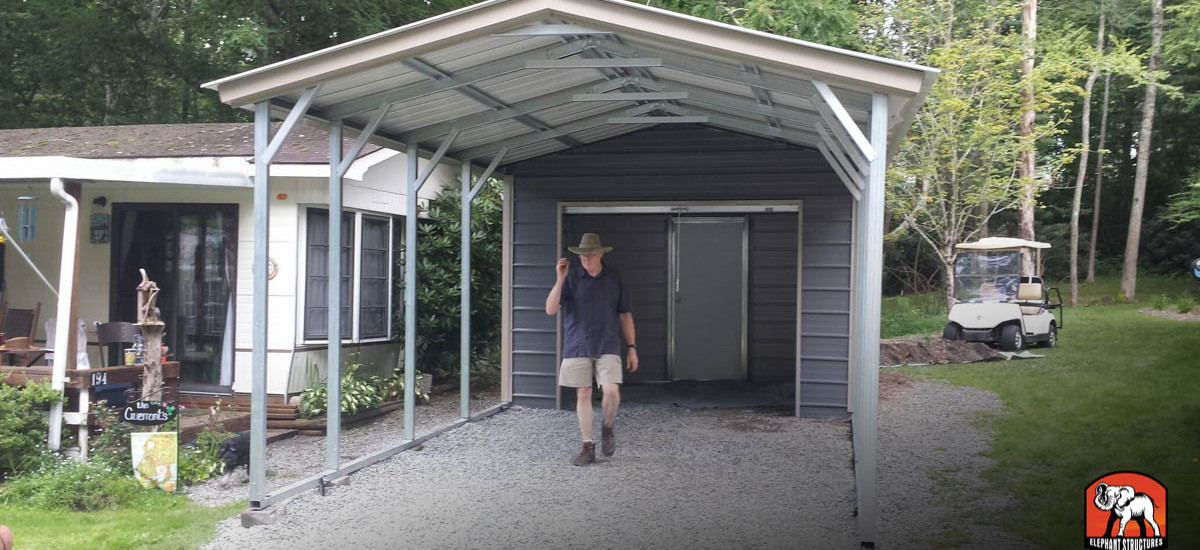 Utility shed carport with roll up garage door and walk in.