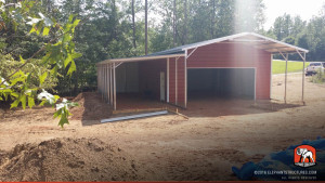 Metal building with lean to, utility shed, and roll up garage door.