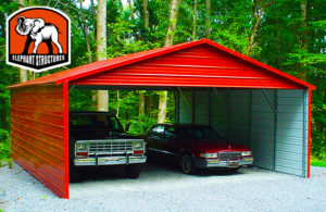 two cars stored safely under a new red carport