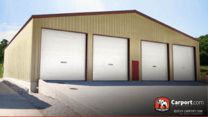 A custom metal warehouse with four garage doors.